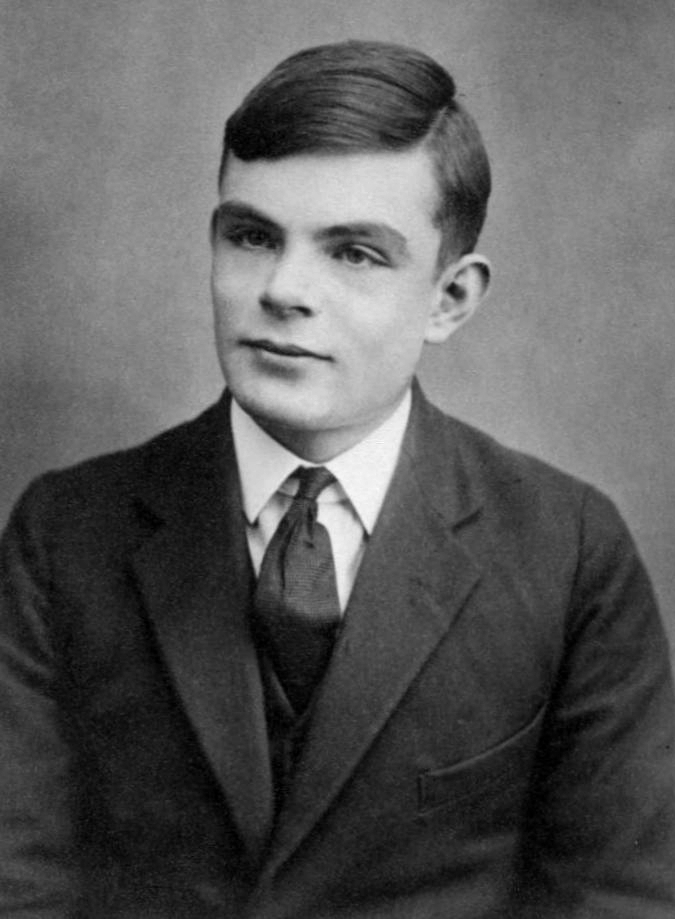 Alan Turing — public/press photo (Wikimedia Commons)