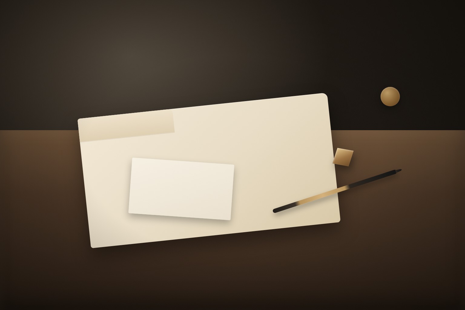 Cream stationery folder with gold cube and pen on walnut desk for SWE-2 briefing